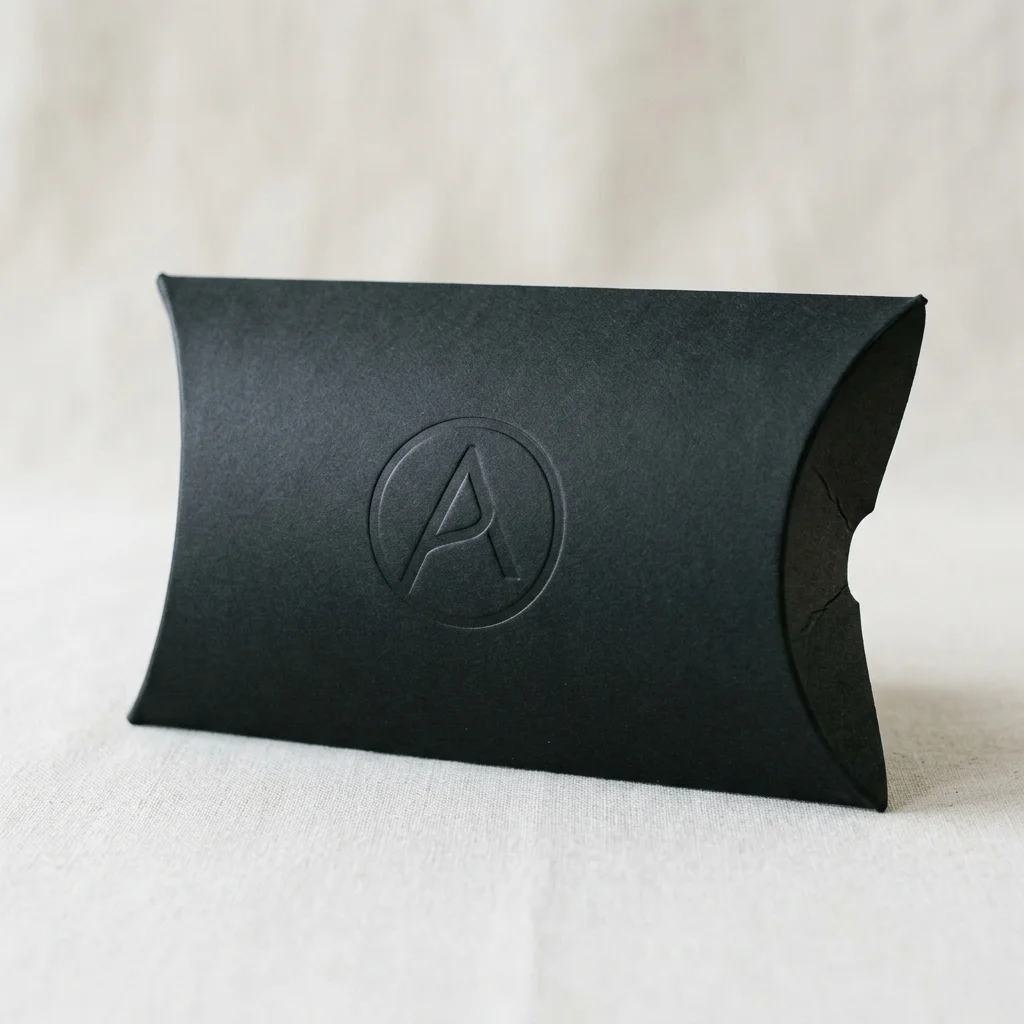Premium custom printed black paperboard pillow box